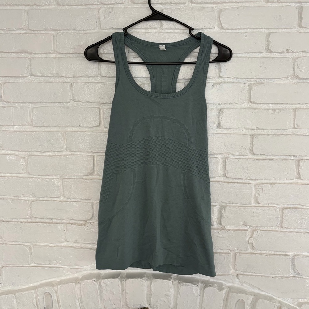 Women’s lululemon activewear tank top size 8 with peloton logo on back green